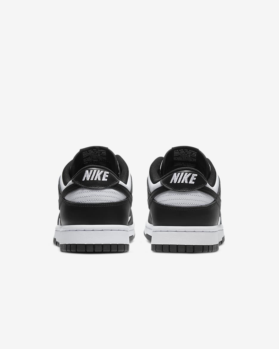 Nike dunks low black with white sole hotsell